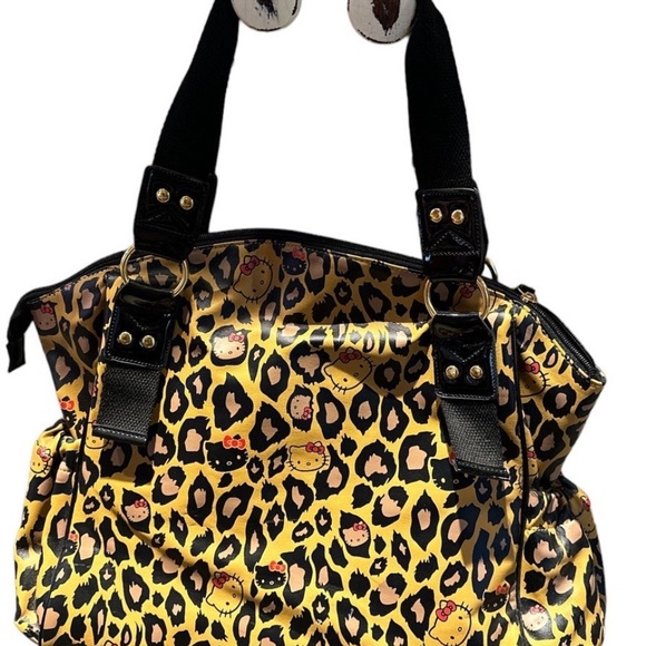 Modern Loungefly hello kitty cheetah rare diaper or...